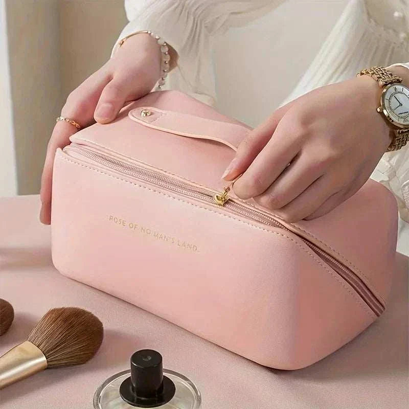 compact travel makeup bag with zipper closure and PU leather exterior for organized beauty essentials