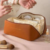 stylish travel makeup bag with zipper closure and spacious PU leather interior for organizing beauty essentials