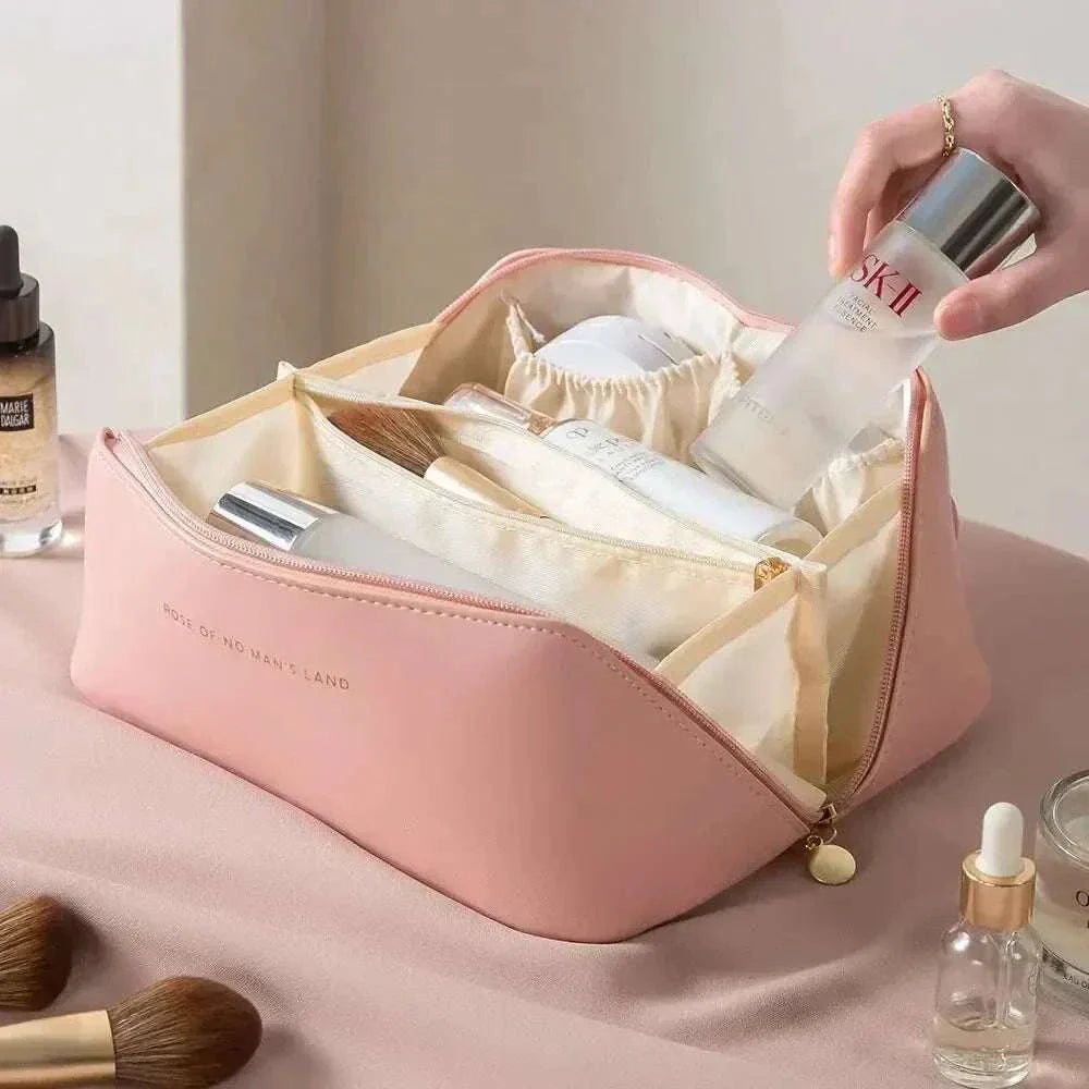 Stylish travel makeup bag with spacious interior and PU leather exterior for organizing beauty essentials on the go