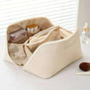 Stylish PU leather travel makeup bag with zipper closure and spacious interior for organizing beauty essentials